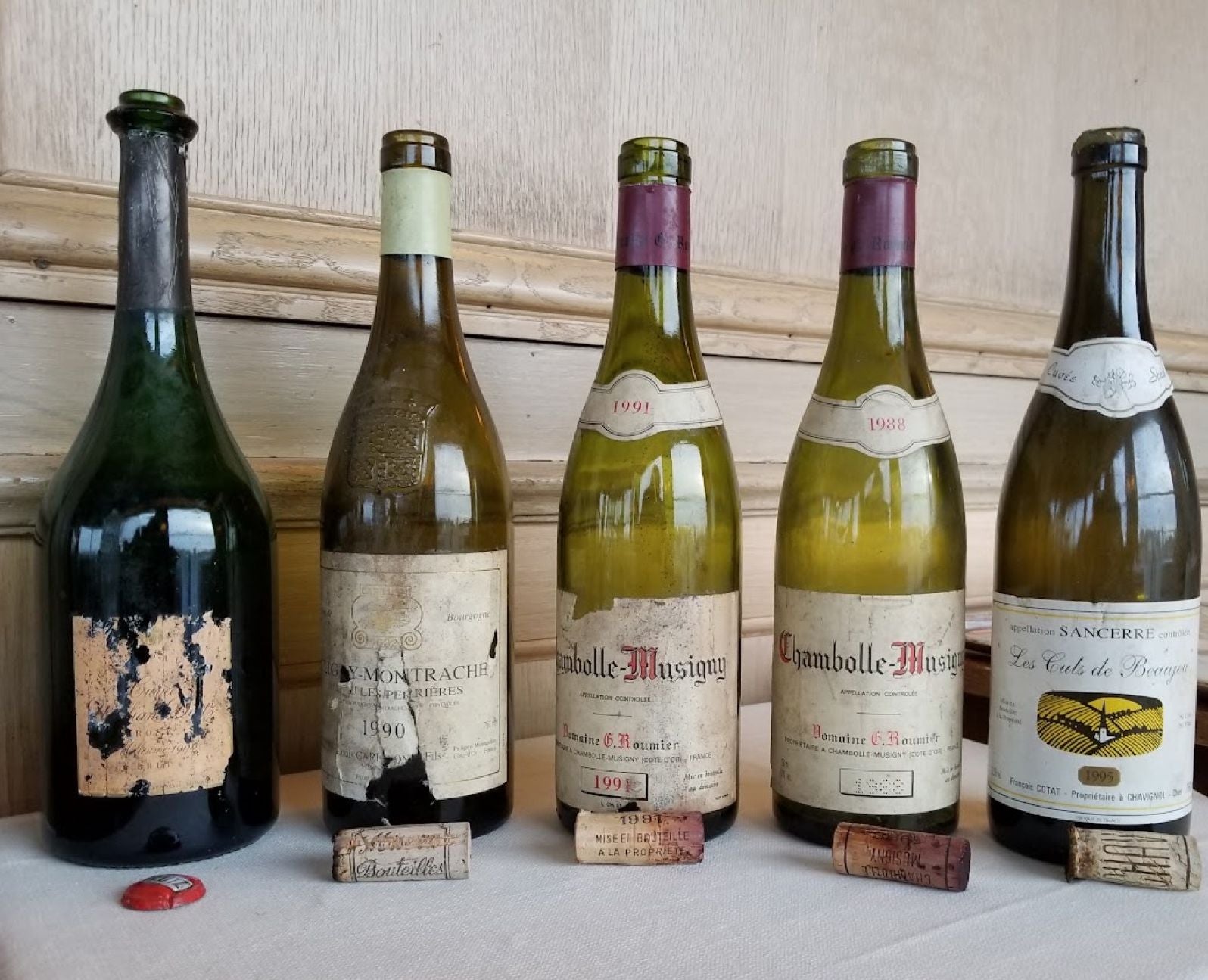 Aged bottles of white Burgundy