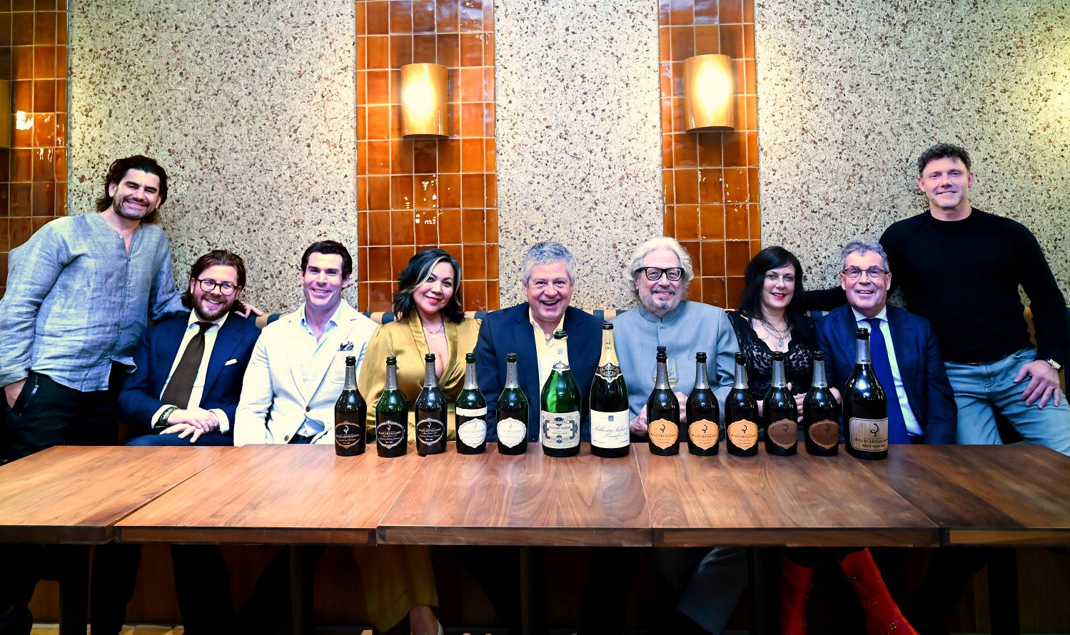 Dan and guests with a line-up of Billecart-Salmon
