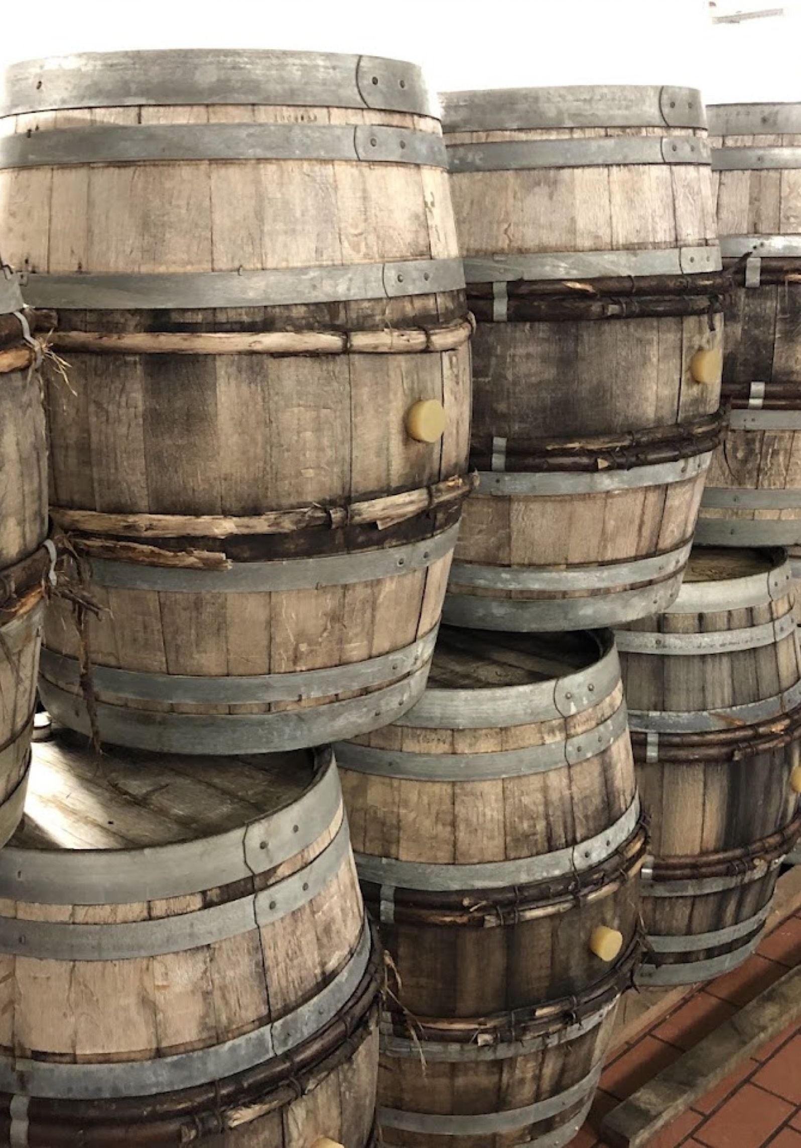 Stacked oak barrels