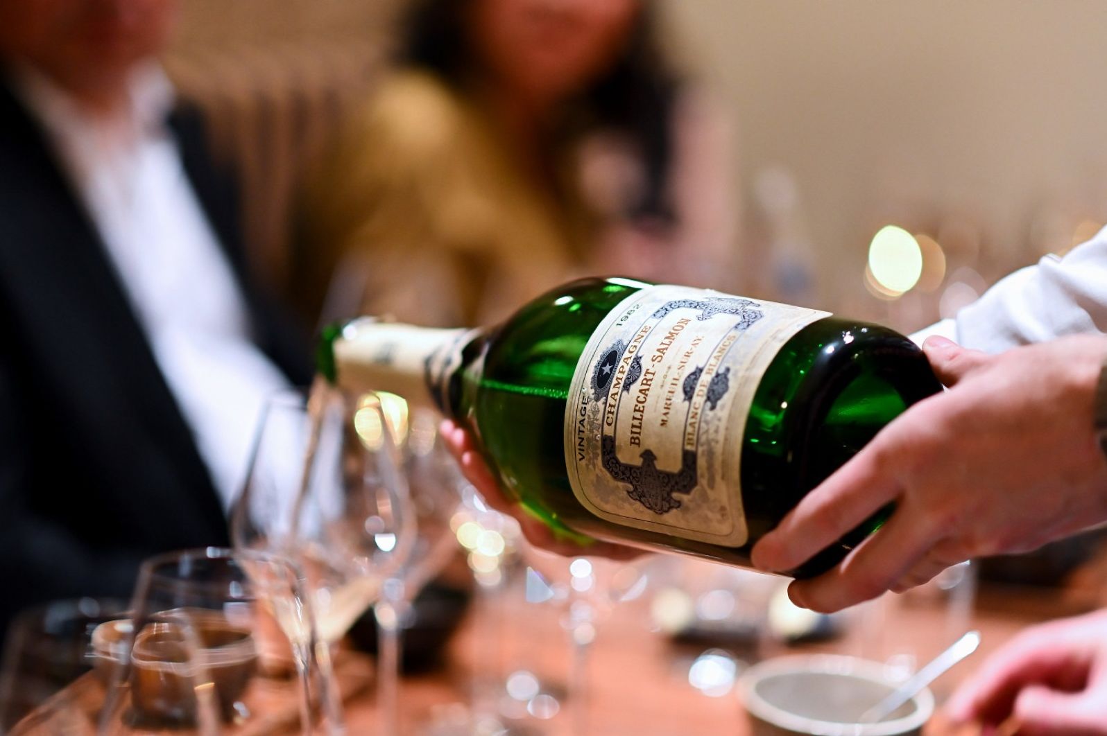 Pouring a magnum at the table