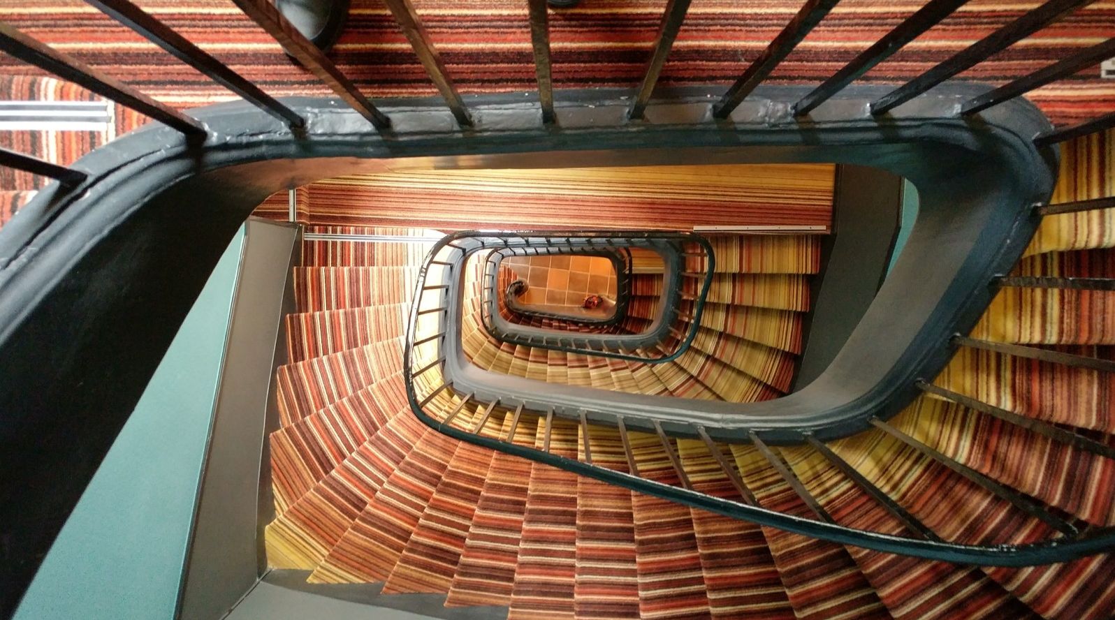 A spiral staircase seen from below