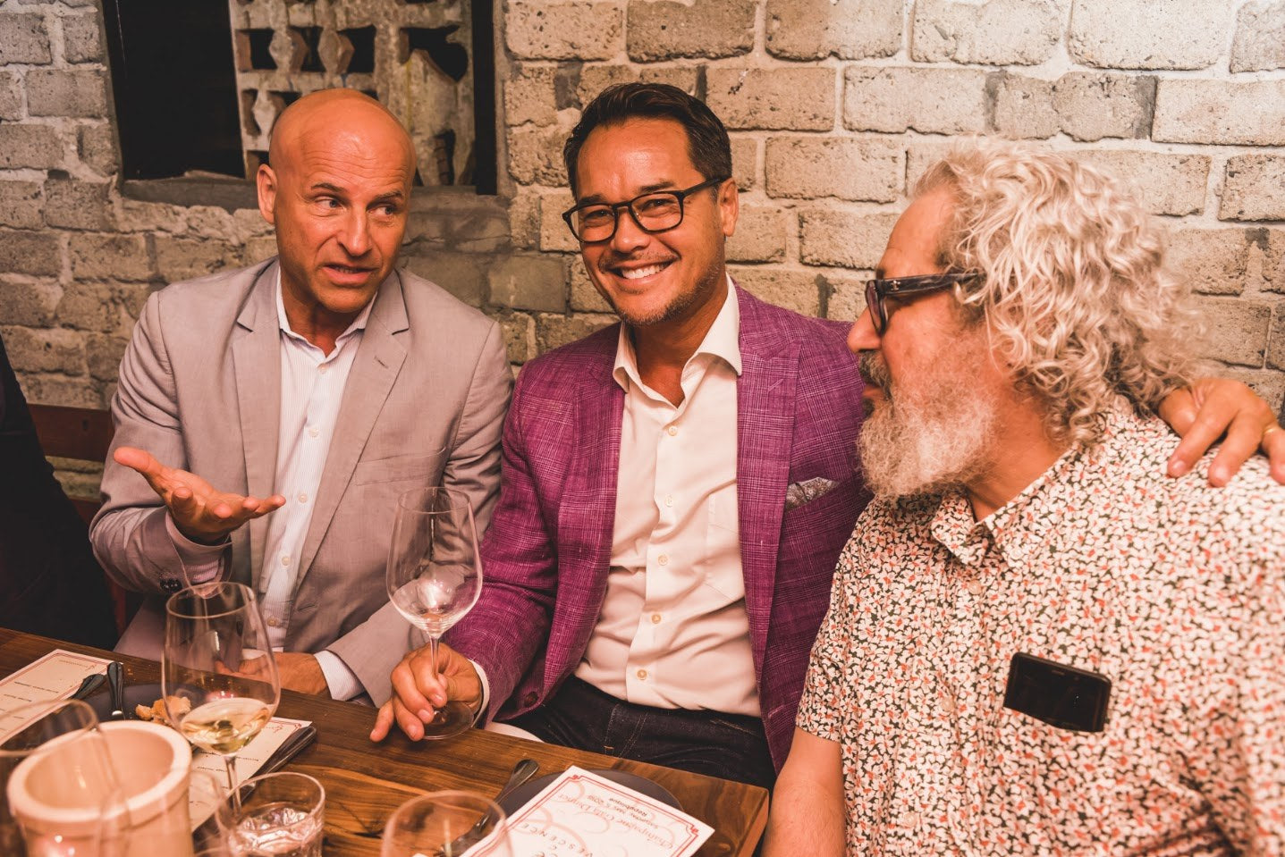Dan at the table with guests